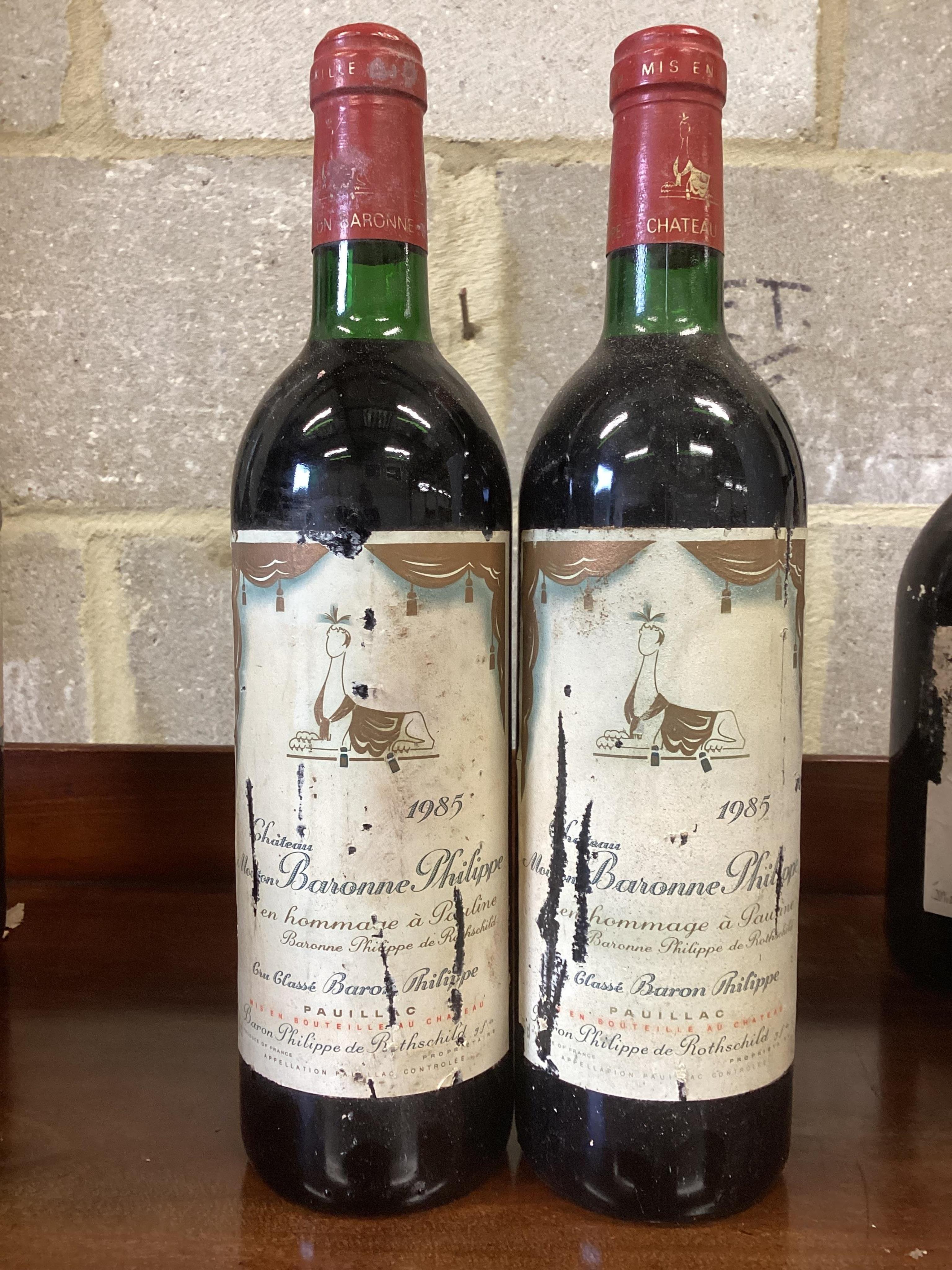 Two bottles of Chateau Mouton Baronne Philippe Pauillac, 1985. (From a local private cellar). Condition - fair, labels degraded